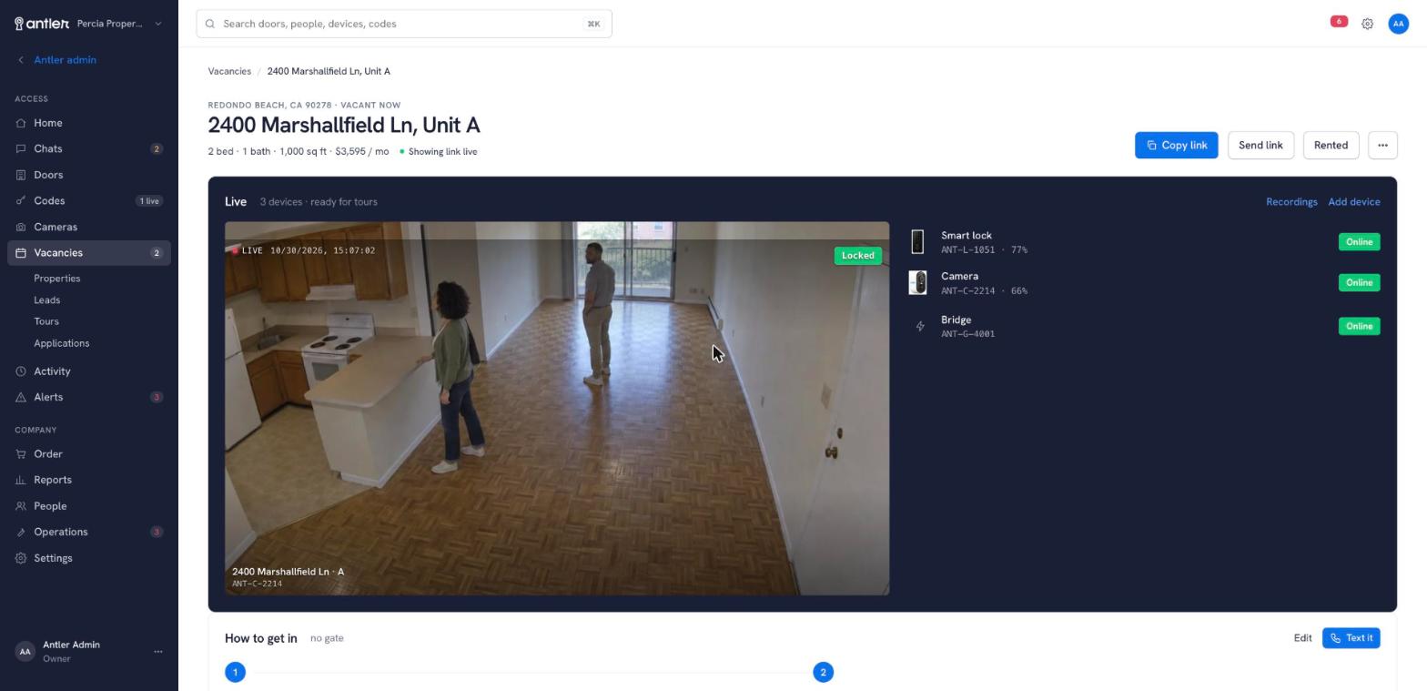 A vacant home: live camera with two people touring, smart lock, camera and bridge online